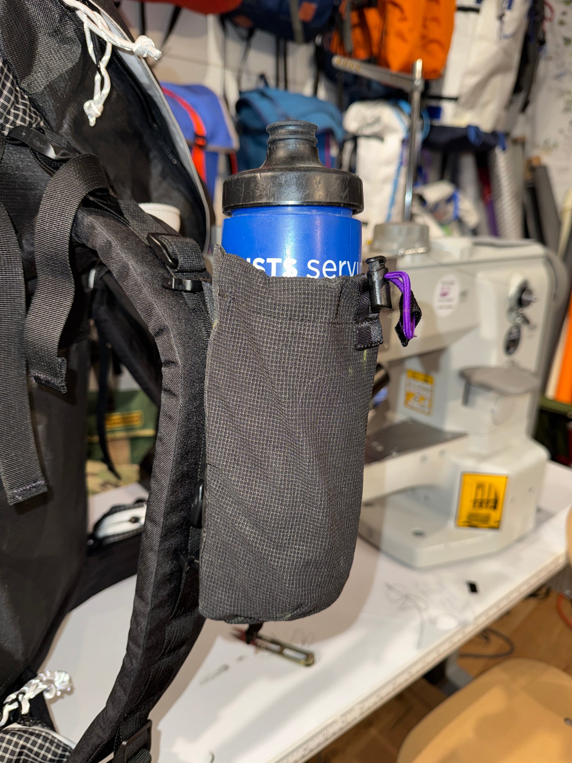 Bottle pocket/ shoulder strap mount